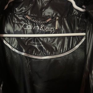 Calvin Klein. Size L puffer coat with hood